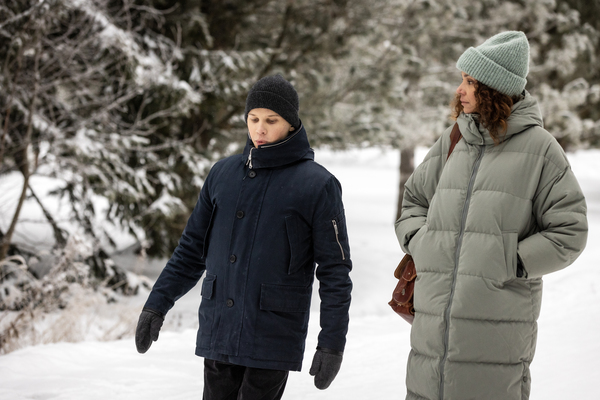 Evilside actors Verneri Eronen (acting Tuomas) and Amira Khalifa (acting Ulla) walking in snow